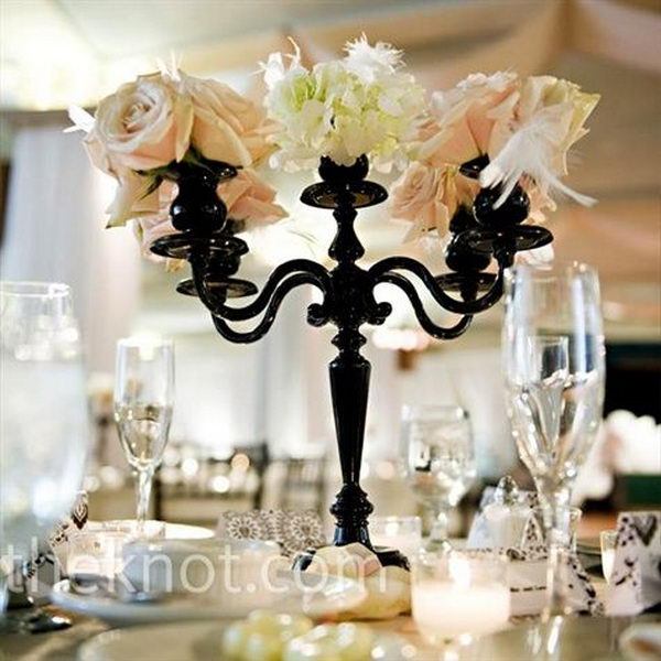Small Black Candelabras with Feathers, Hydrangeas and Roses.