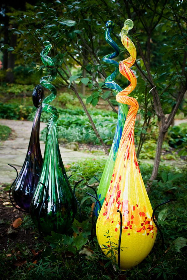 Sun Spire Kitras Art Glass. These organic whimsical creations are made to look like they grew right out of the ground.