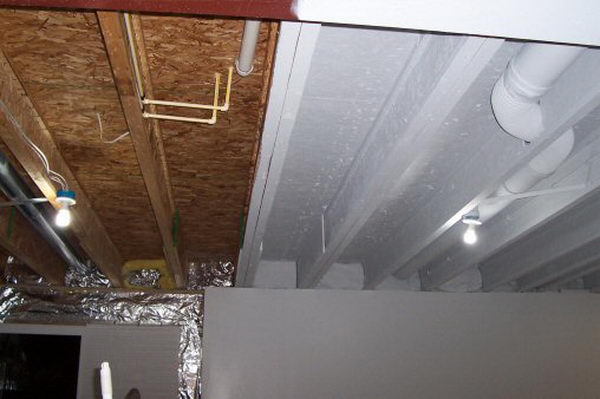 Industrial Look Basement Ceiling Painting. Instead of drywall or drop ceiling, paint it all with an Airless Sprayer in white to make it uniform but blend in and bright.