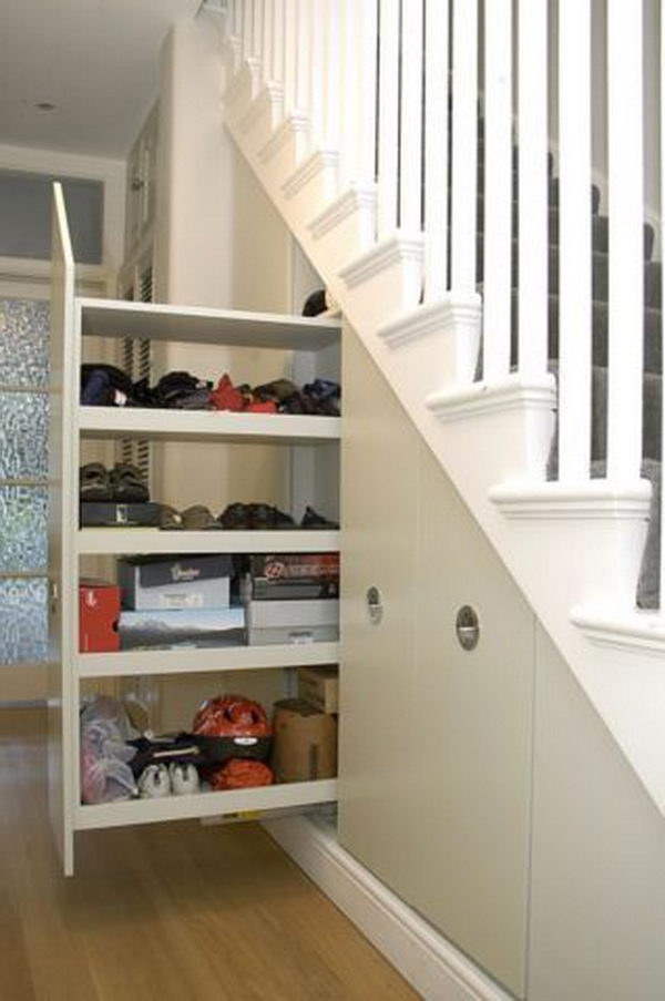 Pull-out Storage Under Stairs. Tall broom cupboard with pull-out under stairs storage.