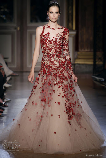 Traditional Chinese Wedding Dress by Zuhair Murad. The red wedding dress is favorite for all Chinese people because red is considered as good luck that can keep evil spirits away.