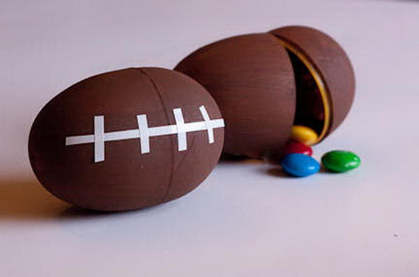 Football Shaped andy Containers. These easy-to-make football-shaped favor boxes are perfect for super bowl-themed snacks.