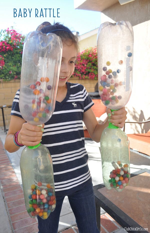 Baby Rattle as a 15 Minute to Win It Party Game. Player must shake gumballs from an empty 2-liter bottle into the other bottle on the bottom.