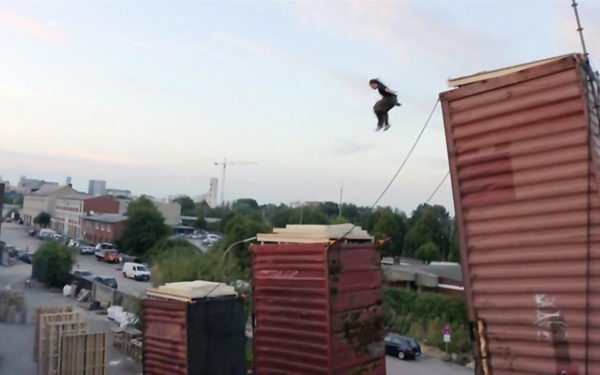 Rube Goldberg Machine Freerunning, This amazingly cool human-powered Rube Goldberg machine is filled with insane obstacles, chain reactions, stunts and excitement. Getting from point A to point B never looked so difficult and awesome.