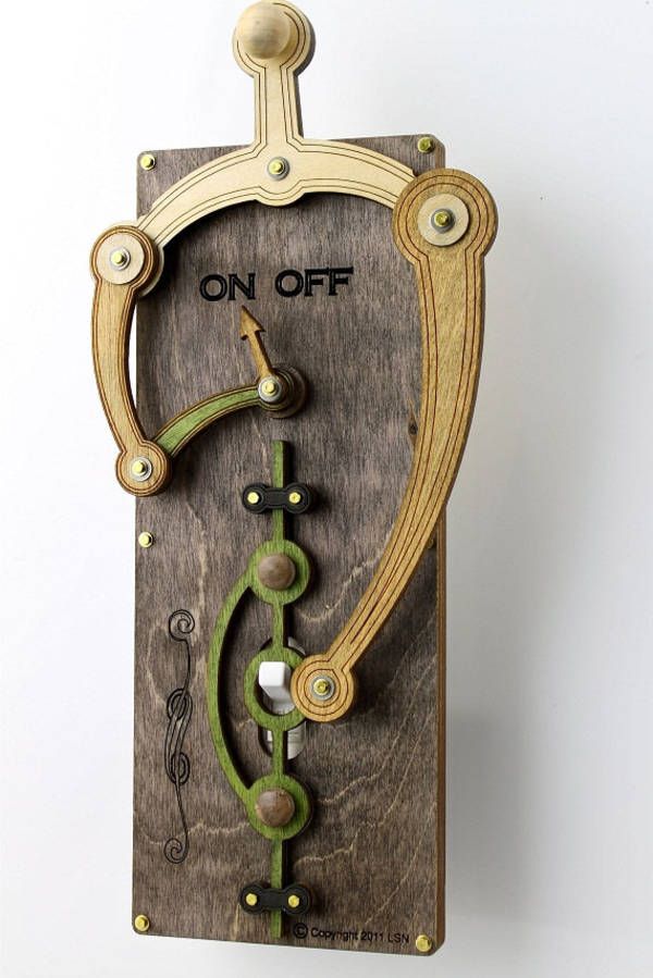 Rube Goldbergian Light Switch Cover, GreenTreeJewelry makes these whimsical, rube goldbergian light-switch covers that let you toggle the switch by means of a delightfully superfluous mechanism.