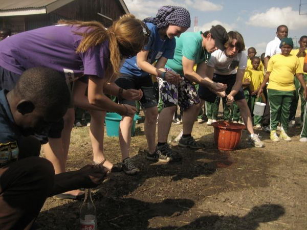 Fill the Bottle. Each team has to fill the empty bottle, passing water from one to another with the palms of their hands without any tools. The team that fills first or the maximum wins.