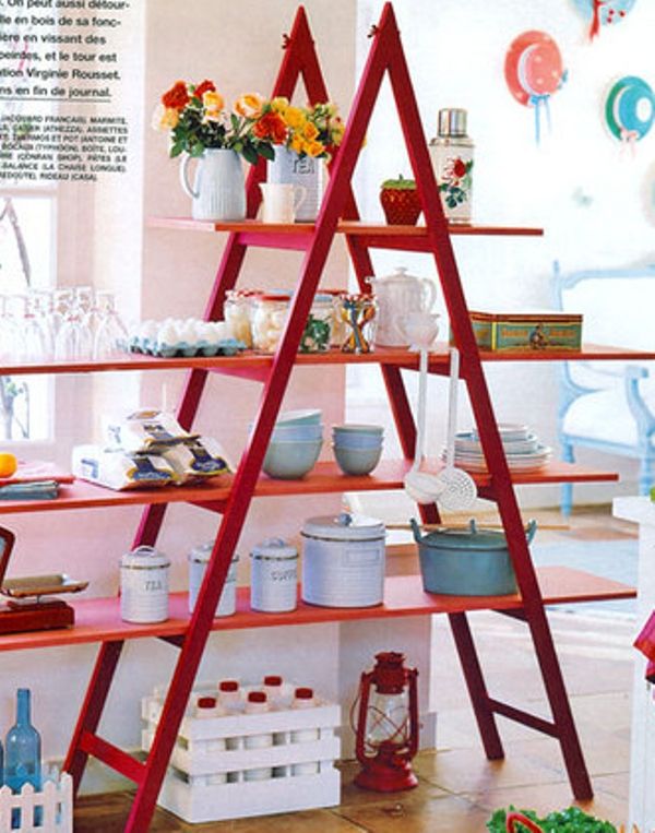 It is a creative decorating idea to have a Red Ladder Shelf in your room.