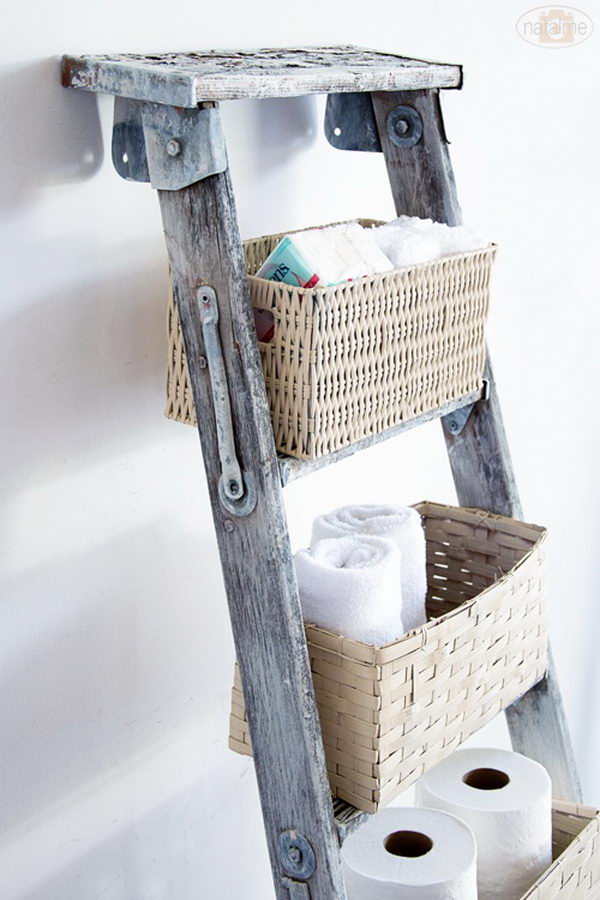 DIY basket ladder storage: Make use of vertical space and add baskets to on old ladder.