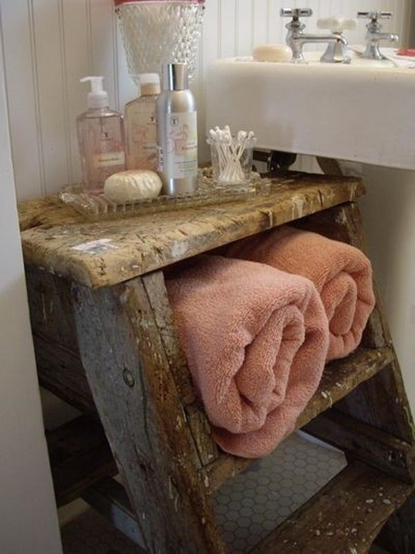 Use Old Wooden Ladder as a table and shelf in the bathroom.