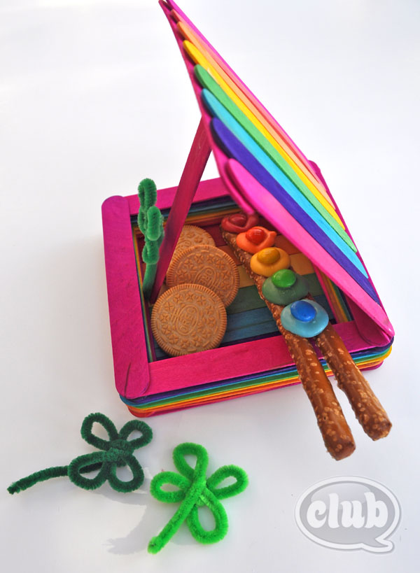 This Leprechaun trap built with rainbow colored popsicle sticks is so cute.