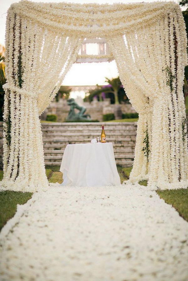 Chuppah With Chains Of White Flowers.