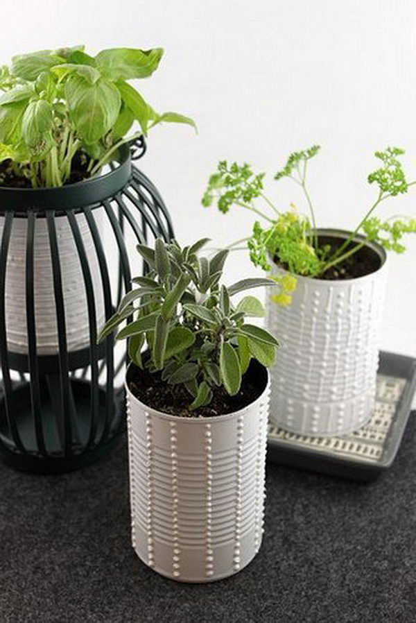 Upcycled Herb Cans as DIY Planters.