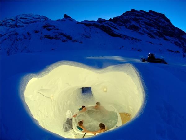 Iglu-Dorf Hotel in Switzerland. Built from scratch every winter, it takes almost 3000 tons of snow to create each Igloo. Standard village consists of Igloo Hotel, Igloo Bar, series of tunnels, and smaller Igloos that serve as private rooms.