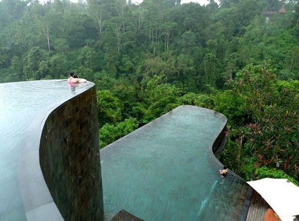 Ubud Hanging Gardens Hotel in Bali. This hotel has a towering, multi-leveled infinity pool that looks like a natural cliffside and was in fact designed to mimic the surrounding hills. In addition to the two main pools, each of the 38 guest rooms at Ubud has its own mini infinity pool with views of the nearby Pura Penataran Dalem Segara temple.