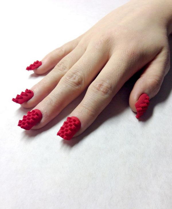 Red 3D Printed Nail Art, 3D nail art is a technique for decorating nails that creates three dimensional designs.