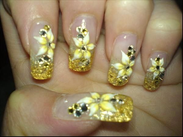 3D Golden Nails, 3D nail art is a technique for decorating nails that creates three dimensional designs.