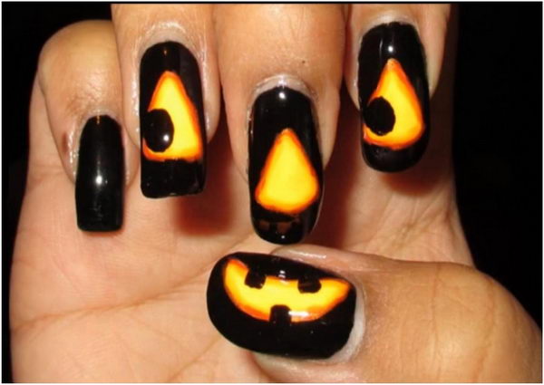Glowing Jack-O-Lantern. Cool Halloween Nail Art which show off your spooky spirit during the freakish festivities.