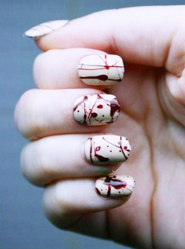 Chilling Blood Splatter Nail Design. Cool Halloween Nail Art which show off your spooky spirit during the freakish festivities.