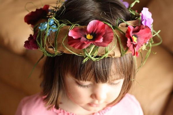 Paper Bag Tiaras. There is no easier costume than a paper bag mask. Grab a paper bag and cut out holes for your eyes then grab a few markers and let your imagination go wild. They are so simple for kids to make and to wear.