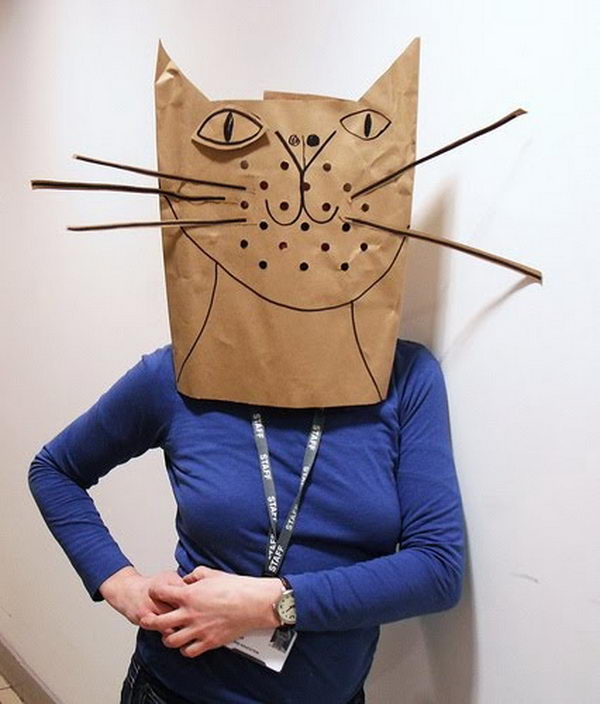 Cat Paper Bag Costume. There is no easier costume than a paper bag mask. Grab a paper bag and cut out holes for your eyes then grab a few markers and let your imagination go wild. They are so simple for kids to make and to wear.