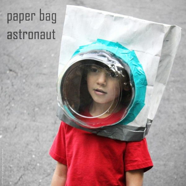 Paper Bag Astronaut Helmet Costume. There is no easier costume than a paper bag mask. Grab a paper bag and cut out holes for your eyes then grab a few markers and let your imagination go wild. They are so simple for kids to make and to wear.