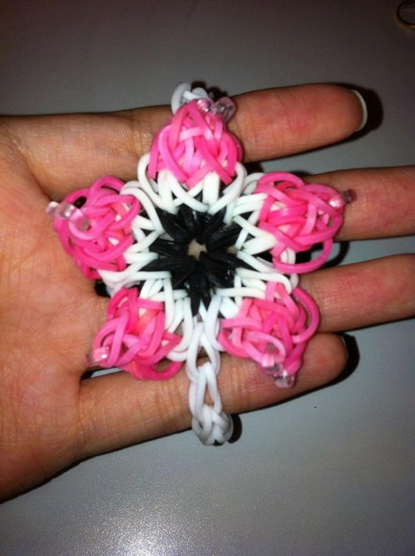Flower Rainbow Loom Bracelet. Rainbow Loom is one of the top gifts for kids, and every kid seems to have at least one piece of rubber band jewelry.