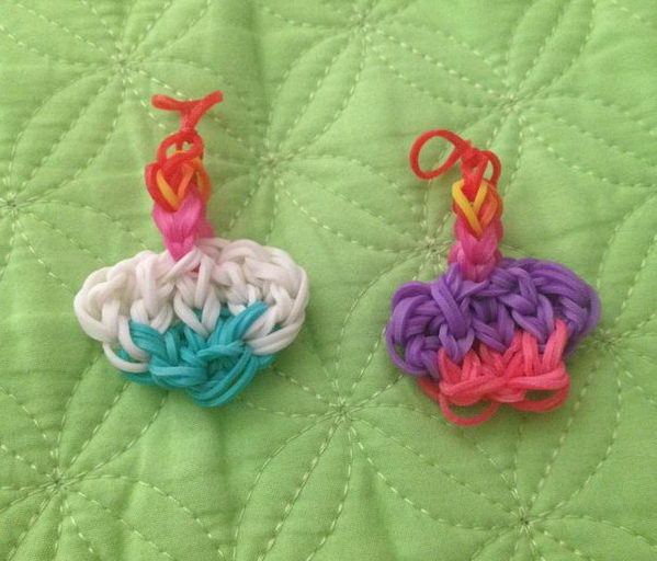 Cupcake Rainbow Loom Charms. Rainbow Loom is a plastic loom used to weave colorful rubber bands into bracelets and charms. It is one of the top gifts for kids.