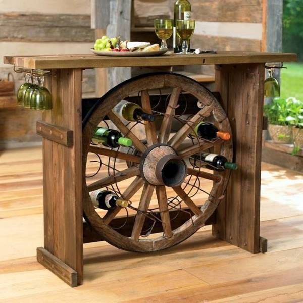 Wagon Wheel Wine Racks. Really fun to create and have an aesthetic appeal that applies to your unique home.