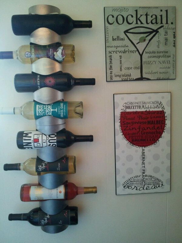 DIY Wall Mounted Wine Rack Idea. Really fun to create and have an aesthetic appeal that applies to your unique home.