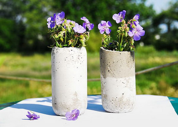 DIY Concrete Vases. Concrete isn’t just for the infrastructure and base of certain buildings. You can use concrete in a variety of DIY projects, and infuse it into everyday products.
