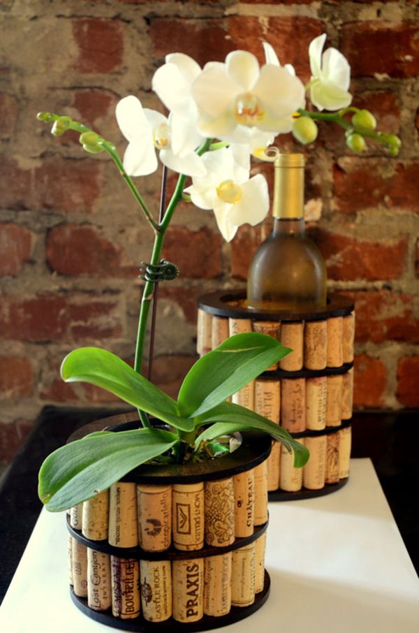 Recycled wine cork vase. These container gardening ideas offer a great way to brighten your surroundings immediately. Make your home look different unique and interesting.