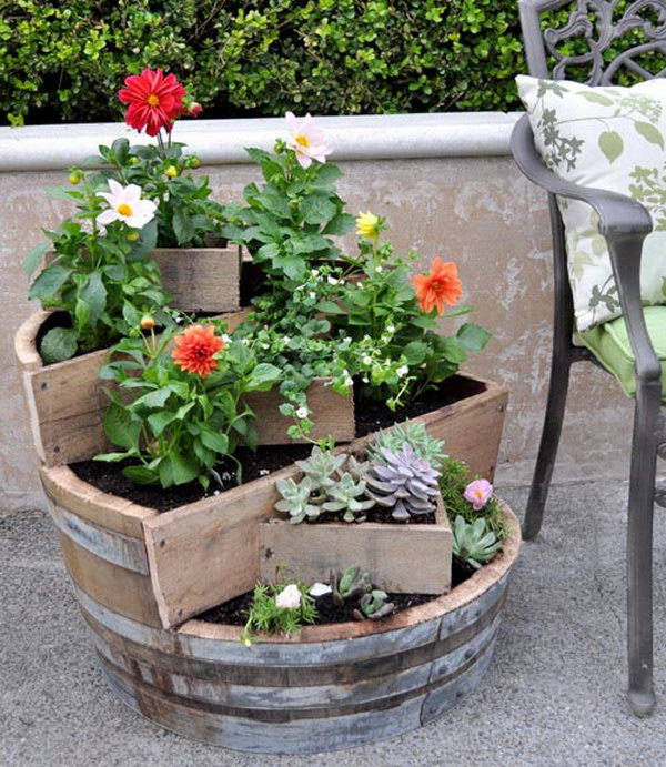 DIY recycled barrel garden pots. These container gardening ideas offer a great way to brighten your surroundings immediately. Make your home look different unique and interesting.