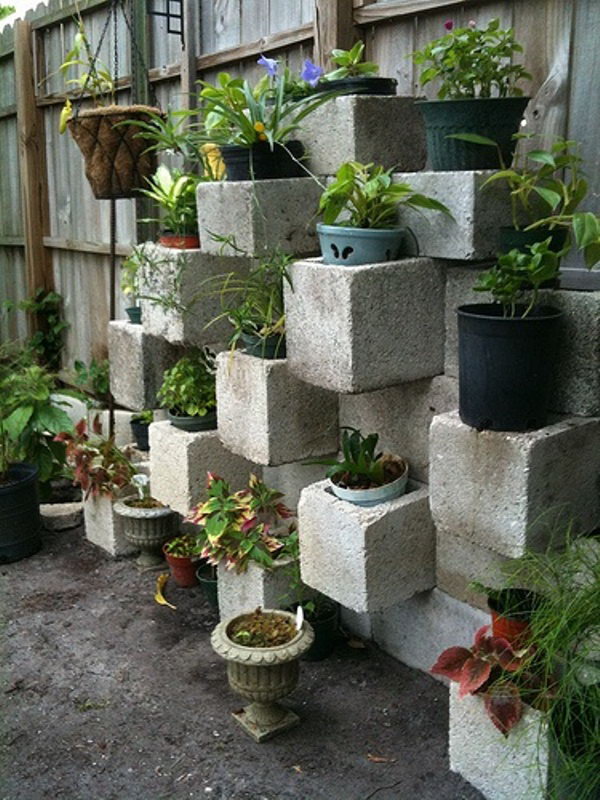 Cinder block focal point vertical planter. These container gardening ideas offer a great way to brighten your surroundings immediately. Make your home look different unique and interesting.