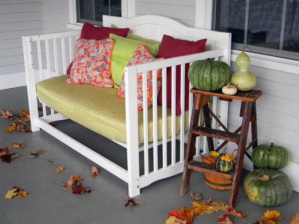 Baby crib repurposed front porch daybed.