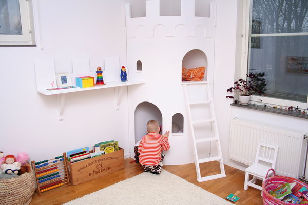 Castle playhouse for kids. Great idea to bring the fun indoors.