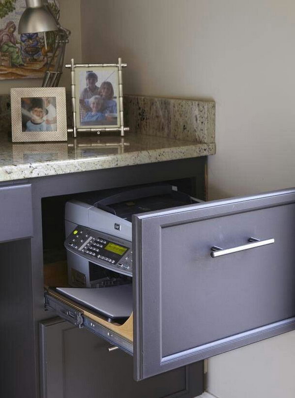 Hide Office Equipment in Drawer. Creatively organized home office boosts your mood and make you more productive.