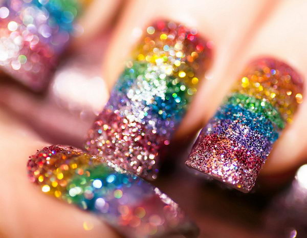 Cool Rainbow Nail Art. A beautiful and fun way to brighten up your everyday look or accessorize a special occasion outfit.