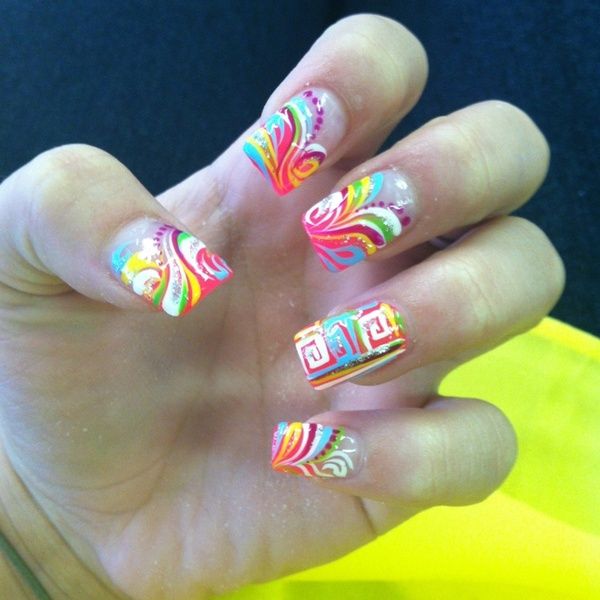 Cool Rainbow Nail Art. A beautiful and fun way to brighten up your everyday look or accessorize a special occasion outfit.