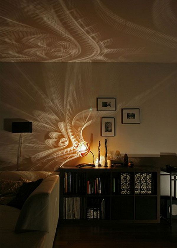 Tropical lamp shadow. Shadow art is a unique form of sculptural art that creates patterns on a wall or canvas using shadows or silhouettes. It is a cool art activity at home to entertain your family and friends.