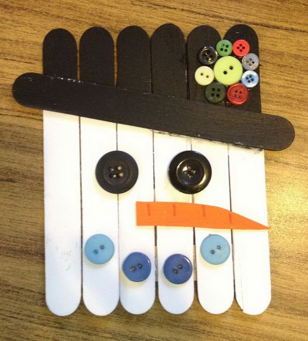 Snowman Made from Sticks and Buttons. 