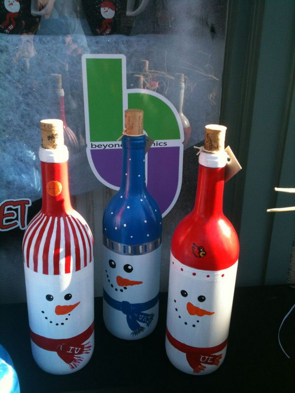 Snowman Painted Wine Bottles. Add charm to any Christmas tree or gift box, and make charming and thoughtful holiday presents for friends and family members.