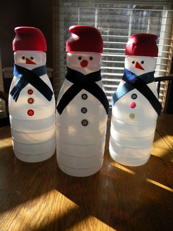 Snowmen from coffee creamer containers. Add charm to any Christmas tree or gift box, and make charming and thoughtful holiday presents for friends and family members.