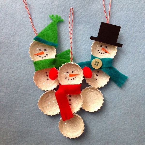 Bottle cap snowman ornaments. Add charm to any Christmas tree or gift box, and make charming and thoughtful holiday presents for friends and family members.
