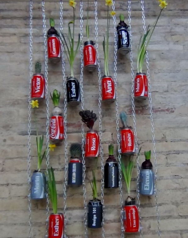 Vertical garden with coca cola cans. After drinking soda from aluminum cans, you can recycle your soda cans to create interesting projects instead of tossing the empty cans into the garbage or recycling bin.