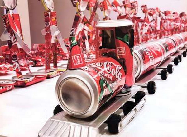 Train craft from coca cola cans. After drinking soda from aluminum cans, you can recycle your soda cans to create interesting projects instead of tossing the empty cans into the garbage or recycling bin.