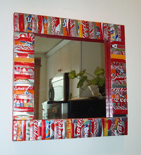 Soda cans framed mirror. After drinking soda from aluminum cans, you can recycle your soda cans to create interesting projects instead of tossing the empty cans into the garbage or recycling bin.