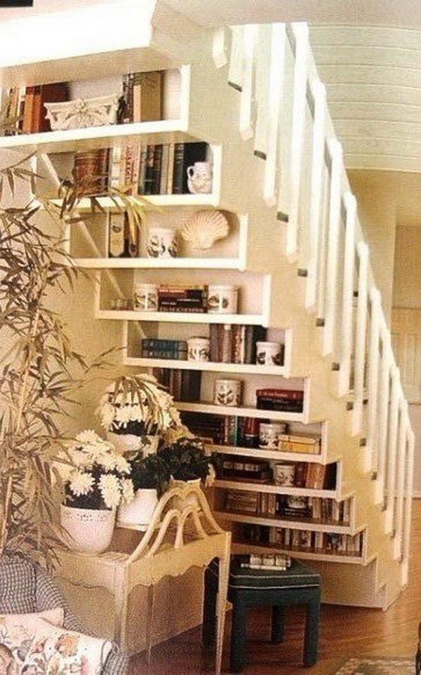 under stair space saving shelving. The space under a staircase can be used to keep everyday clutter out of the way.