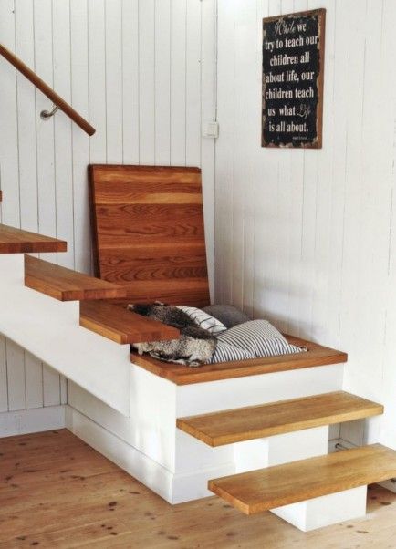 hidden stair storage. The space under a staircase can be used to keep everyday clutter out of the way.