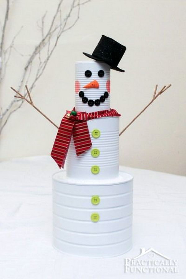 Tin can snowman for christmas. Tin cans are not just for stacking up in your cabinet, tossing in the trash or sending to the recycle bin. Combine those with a rope, paints, craft papers and a generous helping of crazy imagination, and you will have a cool creation on your hands.
