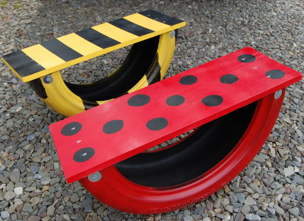 Tire see saw for kids.